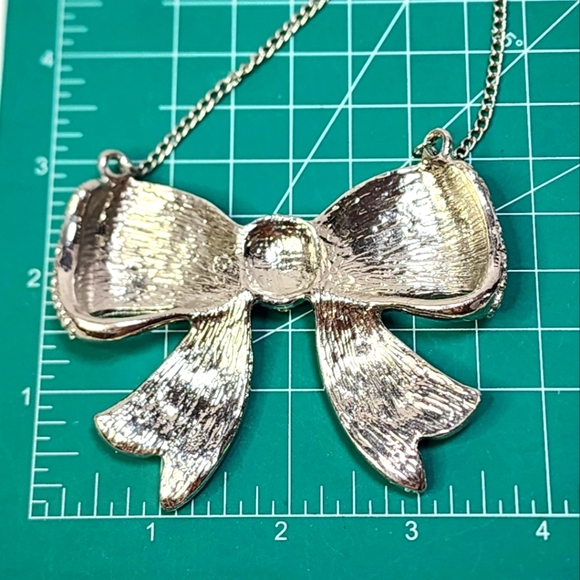Fashion Forward Large Rhinestone and Silver Bow Pendant Necklace - Picture 8 of 11